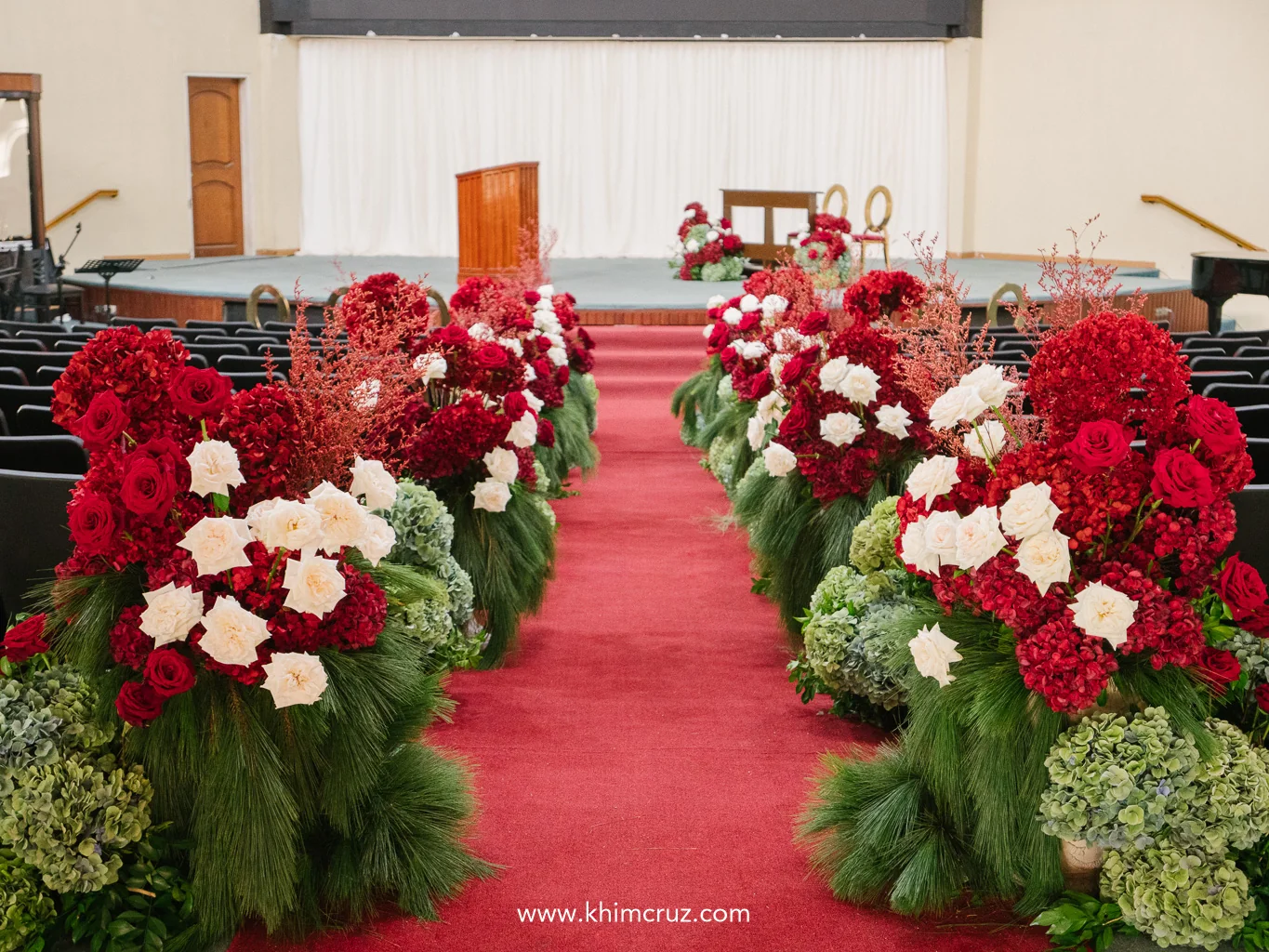 red-green-sculptural-aisle-floral-arrangements-wedding-ceremony-khim-cruz-davao