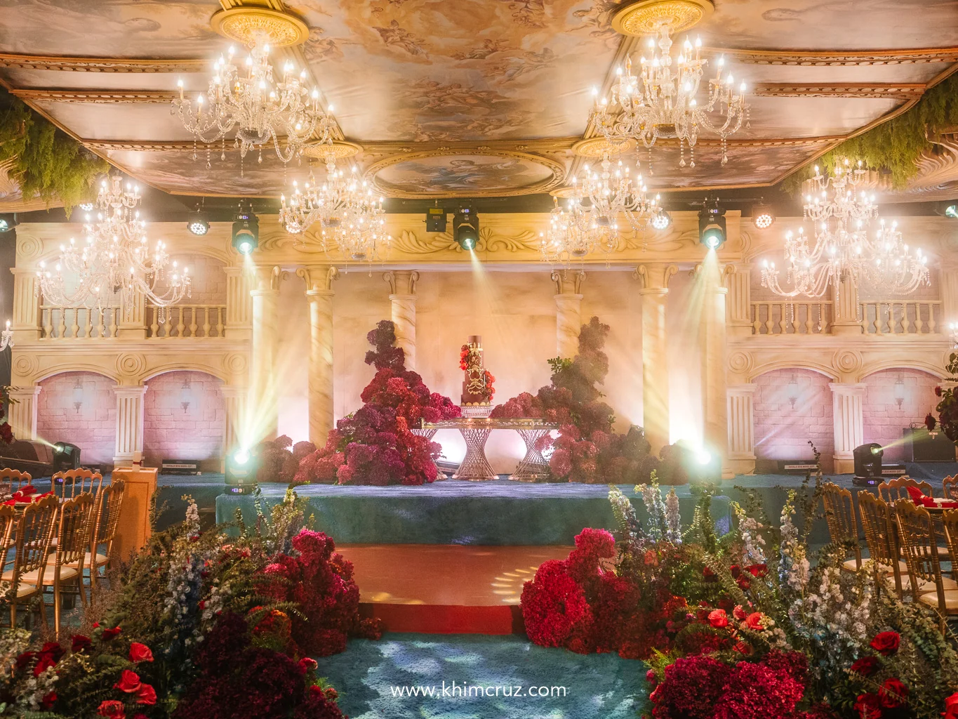 renaissance-debut-ballroom-red-floral-cake-stage-chandelier-khim-cruz-davao