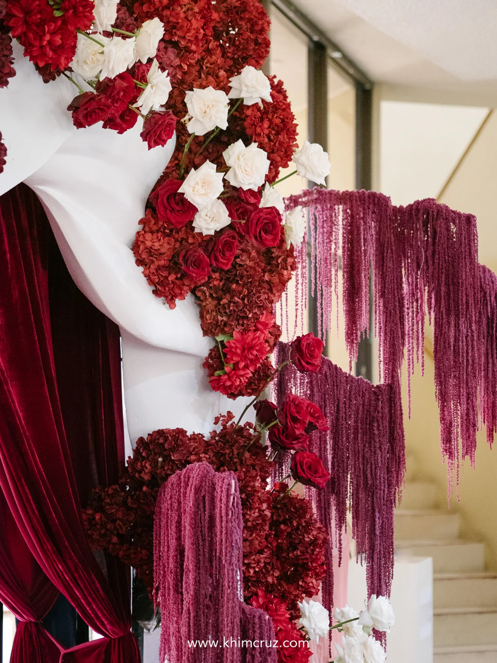 sculptural-red-floral-arch-cascading-amaranthus-wedding-ceremony-khim-cruz-davao