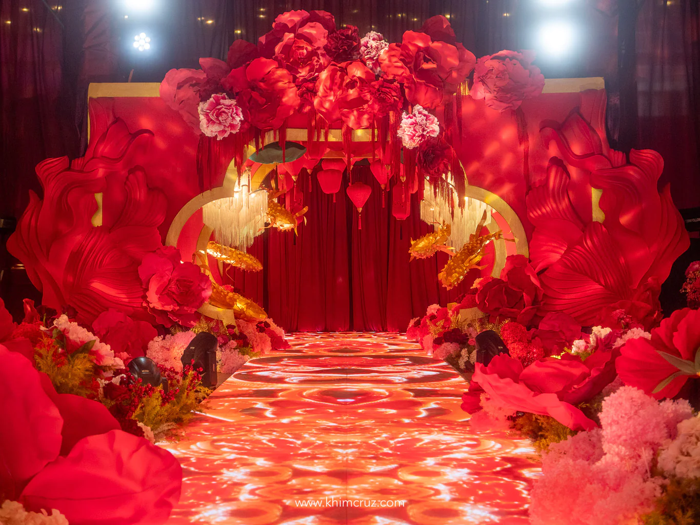 oriental-wedding-entrance-tunnel-red-oversized-florals-koi-led-carpet-davao