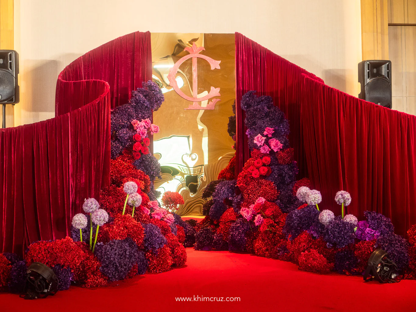 art-deco-50th-birthday-red-velvet-drape-floral-stage-monogram-khim-cruz-davao